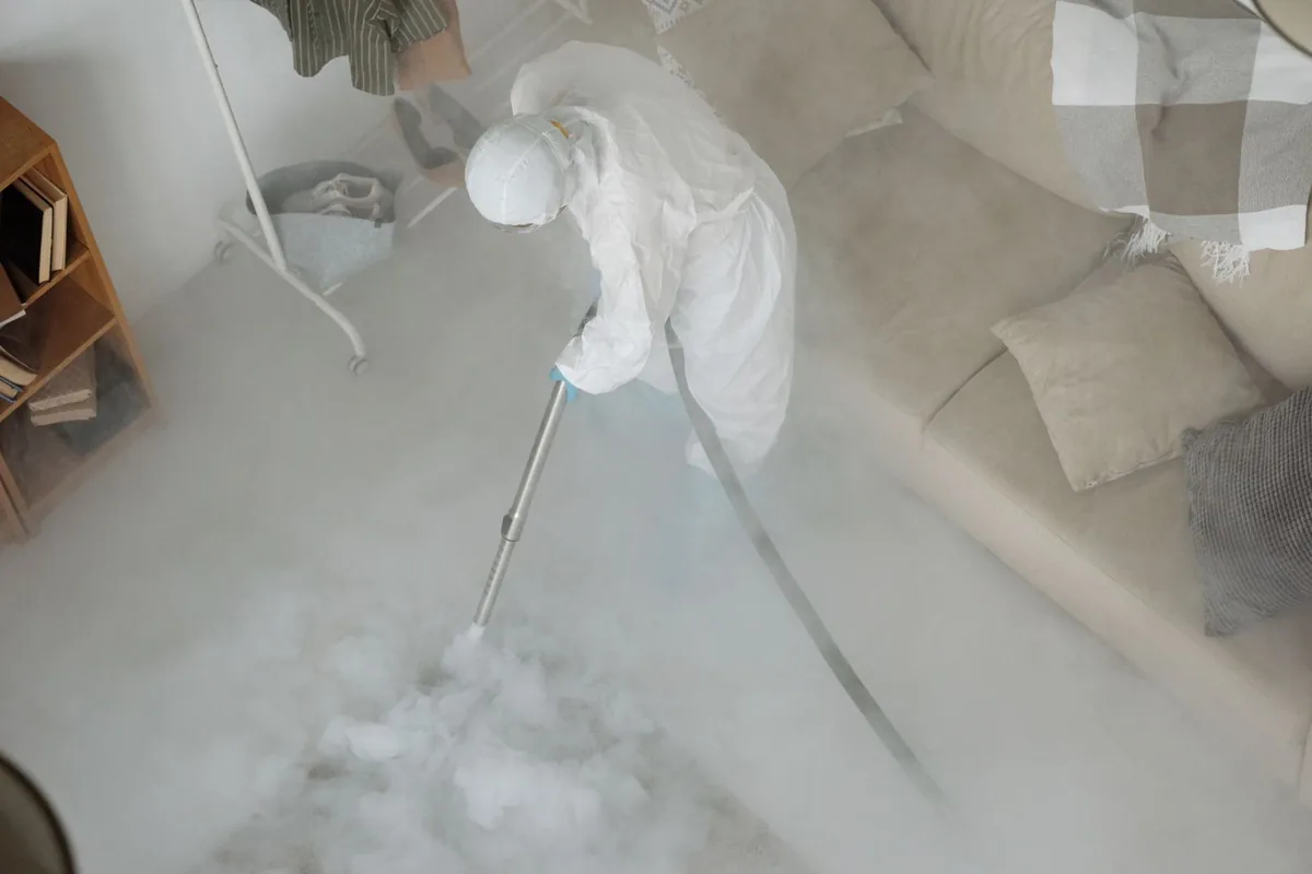 Biohazard cleanup technician in protective equipment, Union City, PA
